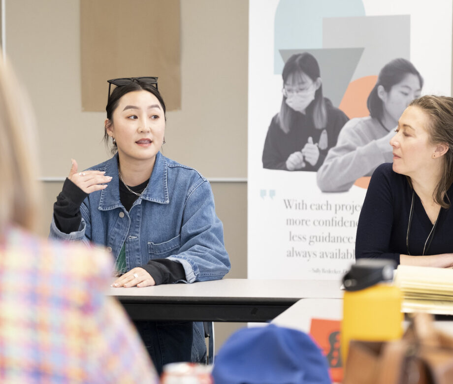People speaking at roundtables.