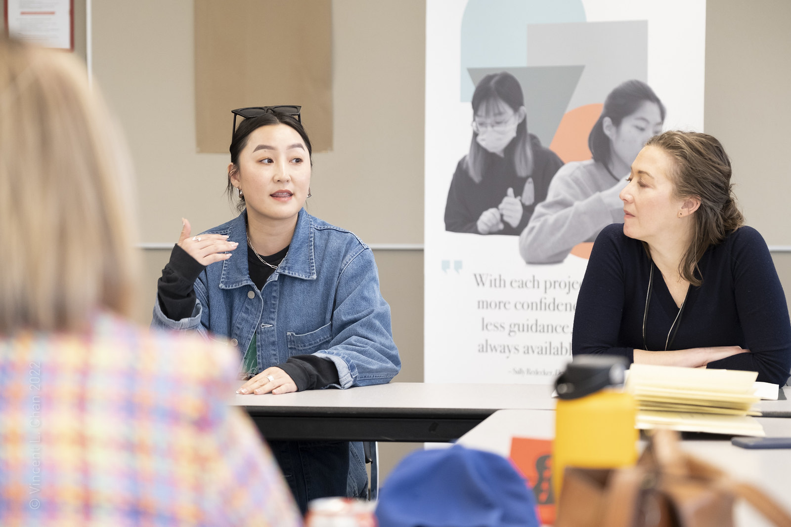 People speaking at roundtables.