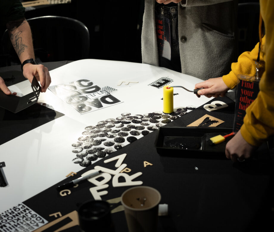 Painting supplies on the table at a workshop.
