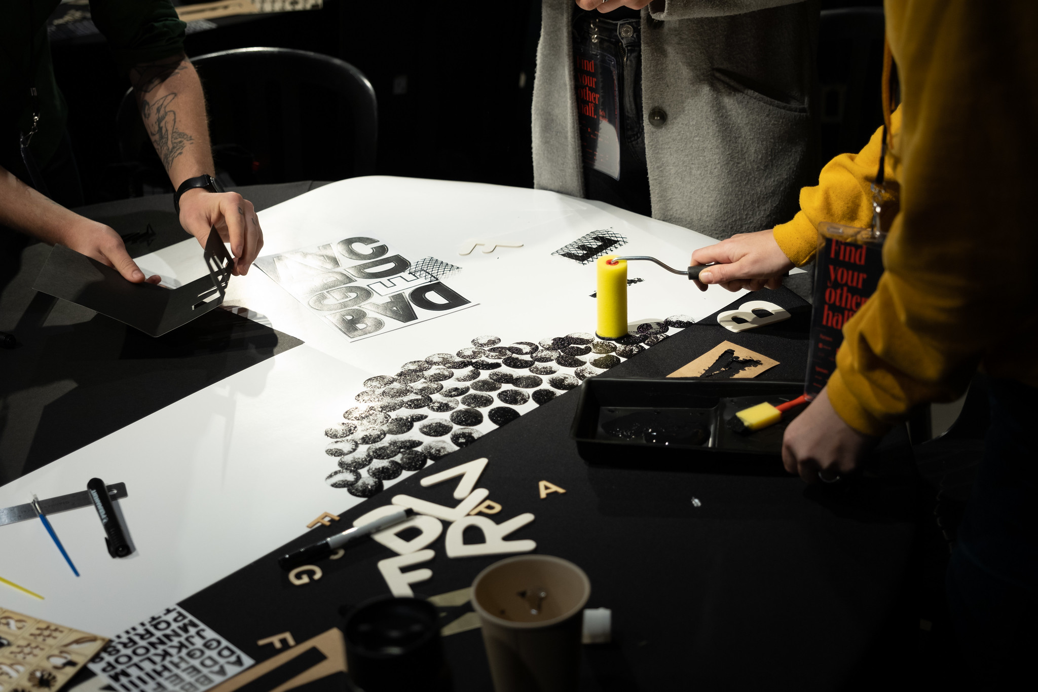 Painting supplies on the table at a workshop.